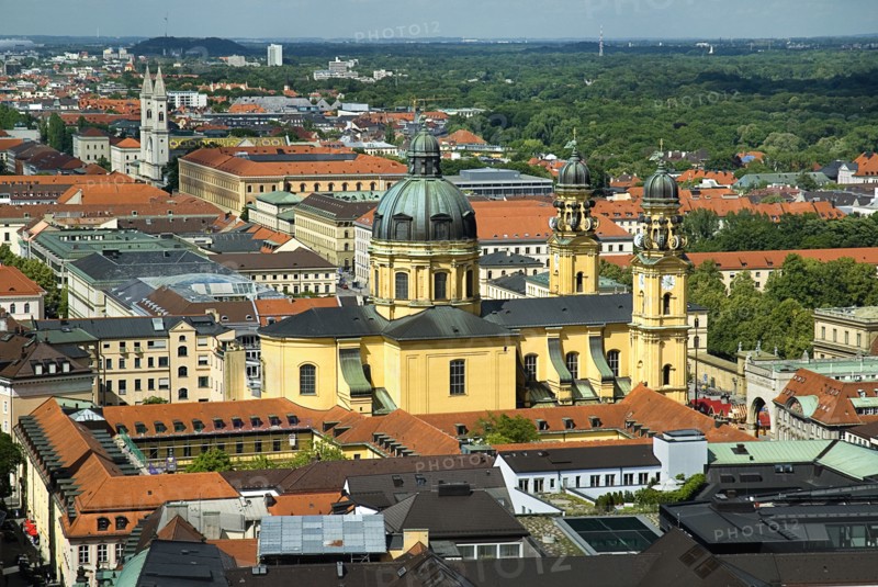 City rooftops with dome of Theatinerkirche St Kajetans Church at centre and Hofgarten on right. View from tower of Frauenkirche ninety-eight metres to the south.. Photo: Hugh Rooney