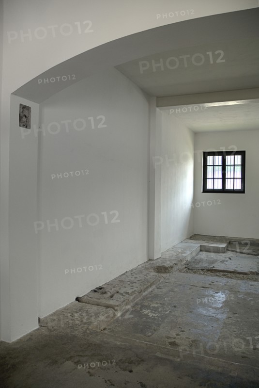 Dachau World War II Nazi Concentration Camp Memorial Site. Empty interior of reconstructed prisoner barracks. Photo: Hugh Rooney