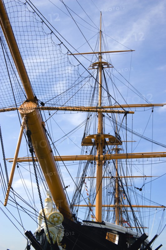 Historic Naval Dockyard Figurehead masts and rigging of HMS Warrior built in 1860 as the first iron hulled sail and steam powered warship. Photo : Paul Seheult