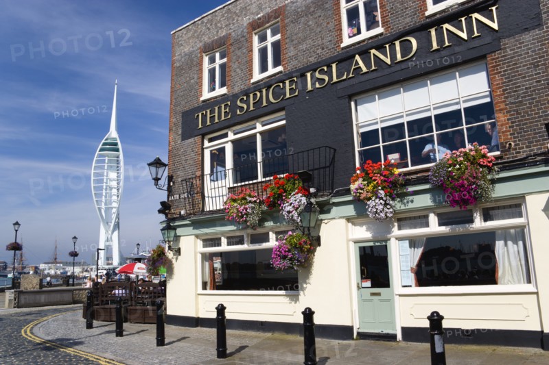 The 170 metre tall Spinnaker Tower and Historic Naval Dockyard seen from Spice Island in Old Portsmouth with The Spice Island Inn in the foreground. Photo: Paul Seheult