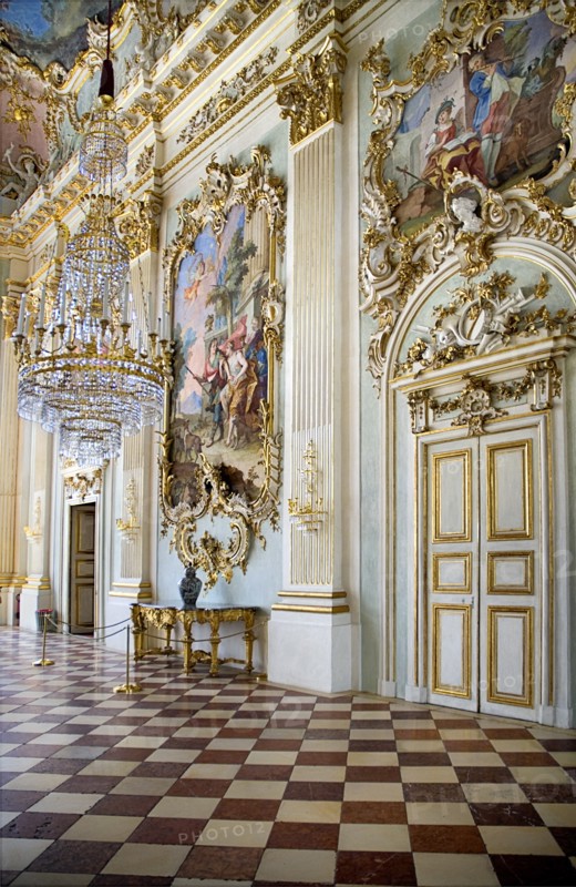 Nymphenburg Palace. Interior of Steinerner Saal the Stone or Great Hall with detail of paintings red and white chequered floor and gold and white baroque decoration by Francois de Cuvillies. Photo : Hugh Rooney