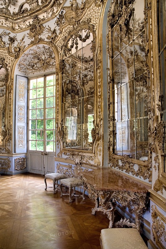 Nymphenburg Palace. Amalienburg The Hall of Mirrors. Hunting lodge created for Electress Amalia in European Rococo style. Highly ornate white and gold interior with mirrored walls. Photo: Hugh Rooney