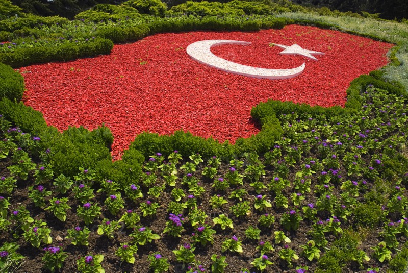 Mausoleum of the founder of the Turkish Republic Mustafa Kemal Ataturk. The Turkish flag depicted in pebblestones surrounded by flower bed. Photo : Hugh Rooney