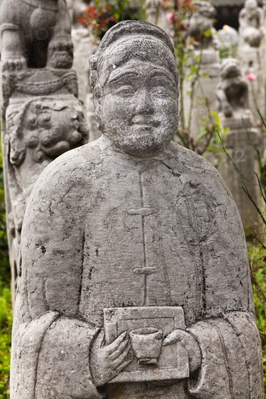 Carved statue of a man in Small Goose Pagoda Park. Photo: Mel Longhurst