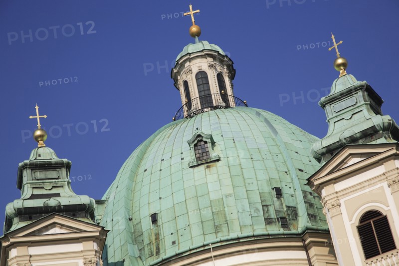 St Peters Church detail of green domed roof and tower tops. Thought to occupy the oldest Christian sacred site in Vienna. Building dates from 1702. Photo: Bennett Dean