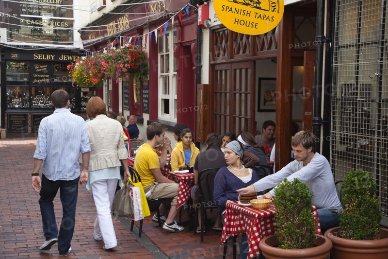 The Lanes people sat outside a Spanish Tapas restaurant. Photo: Stephen Rafferty