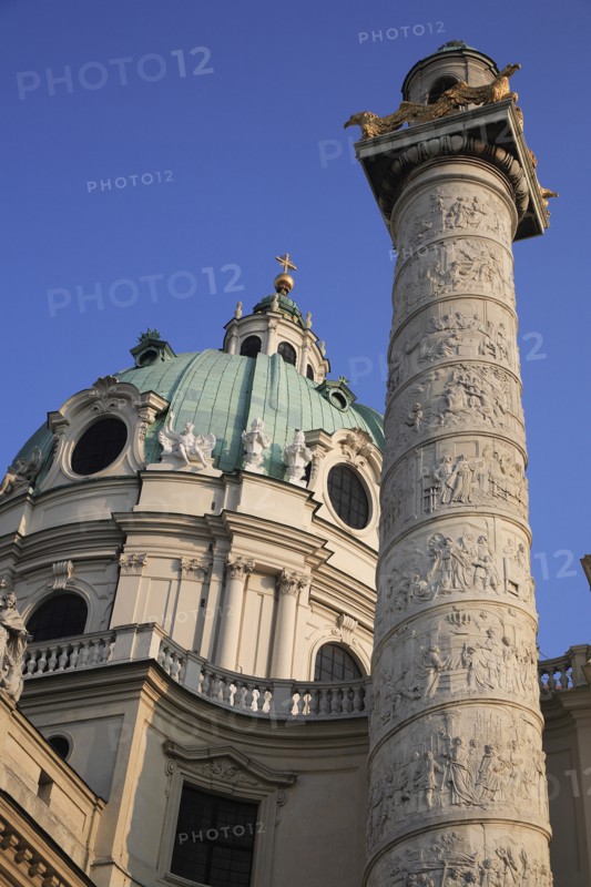 Karlskirche or Church of St Charles Borromeo. Part view of exterior with ellipsoid dome and column. Photo : Bennett Dean