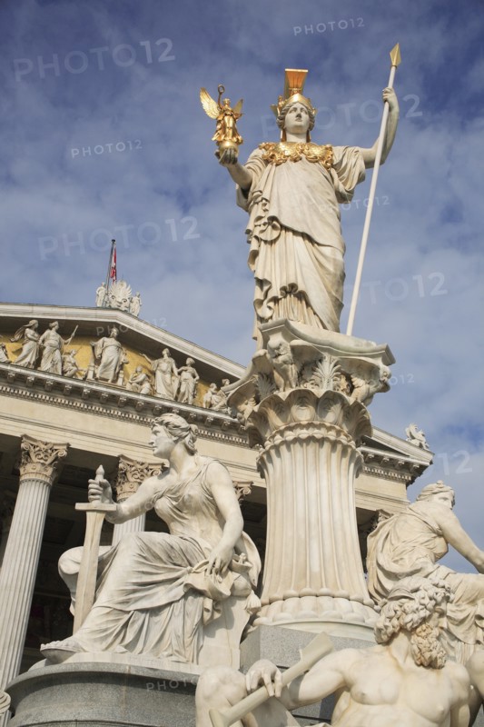 Statue of Athena elevated on column above fountain in front of the Parliament building. Photo: Bennett Dean