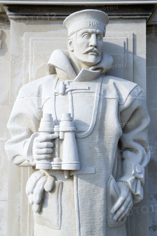 World War Two Naval Memorial on Southsea seafront designed by Sir Edmund Maufe with sculpture by Sir Charles Wheeler of a sailor holding binoculars. Photo : Paul Seheult