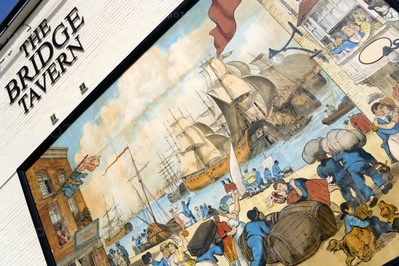 The Camber in Old Portsmouth showing the Bridge Tavern mural of Thomas Rowlansons cartoon titled Portsmouth Point. Photo : Paul Seheult