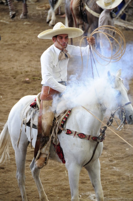 Mexico, Bajio, Zacatecas, Traditional horseman or Charro competing in Mexican rodeo holding lasso. 
Photo : Nick Bonetti