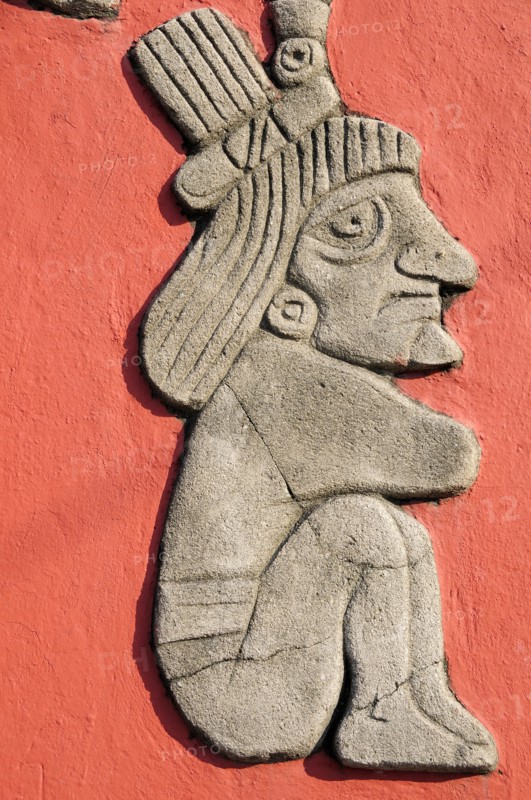 Mexico, Veracruz, Papantla, Detail of relief carving of Totonac figures on the Mural Cultural Totonaca in the Zocalo. 
Photo : Nick Bonetti