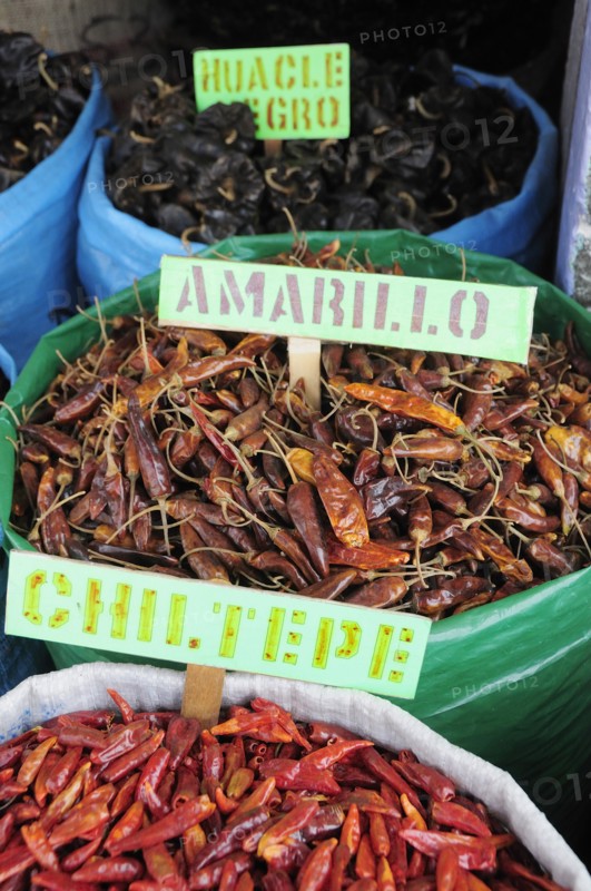 Mexico, Oaxaca, Sacks of dried dried chillies for sale in the market. 
Photo : Nick Bonetti