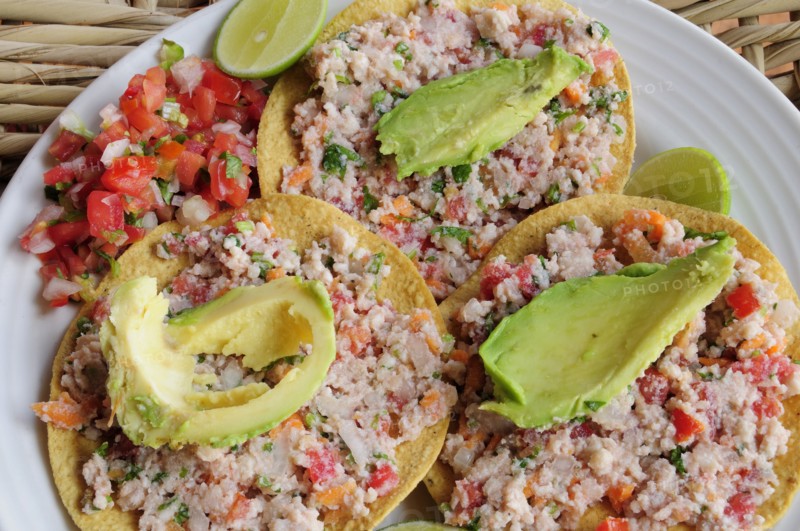 Mexico, Jalisco, Puerto Vallarta, Fish ceviche served with tacos avocado and tomato salsa. 
Photo : Nick Bonetti