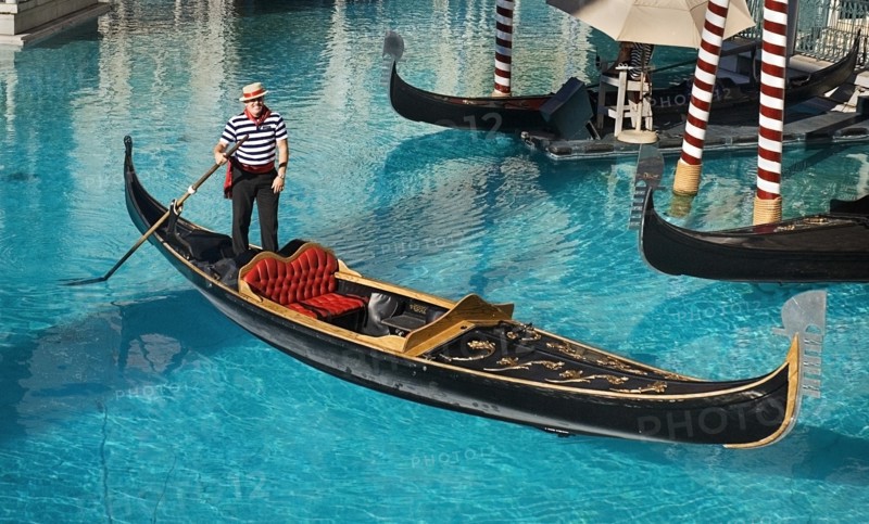 USA, Nevada, Las Vegas, The Strip gondola outside side the entrance to the Venetian hotel and casino. 
Photo : Hugh Rooney