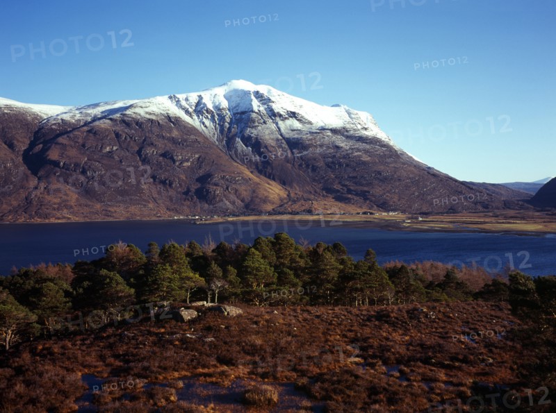 Scotland, Highlands, Torridon, View across Loch Torridon towards south face of Liathach 1055 metres at highest point with snow topped summit. 
Photo : Bryan Pickering