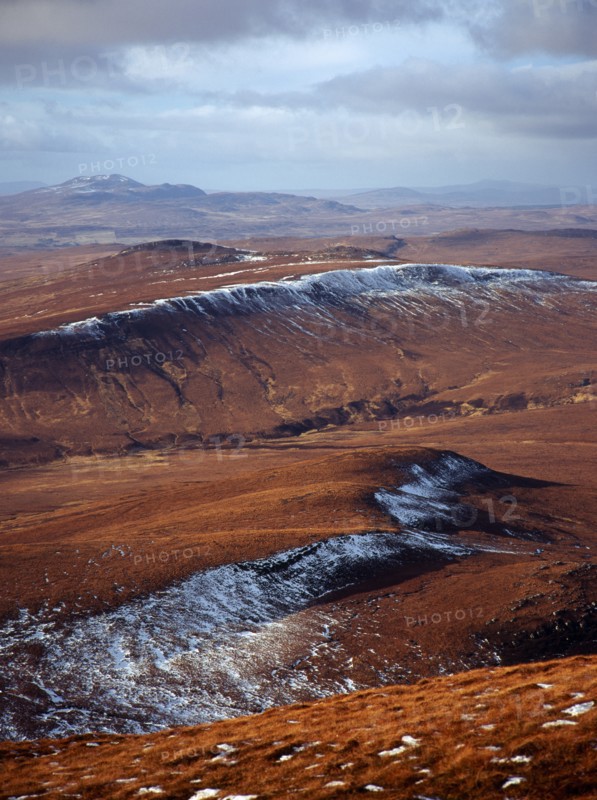 Scotland, Highlands, North, View north west from Ben Griam Mhor Mountain at 590 metres with snow capped ridges facing north east. 
Photo : Bryan Pickering