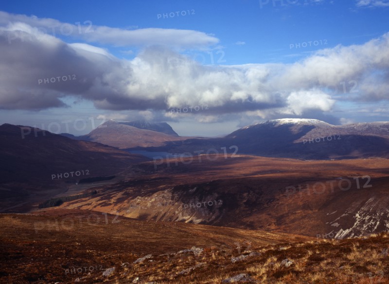Scotland, Highlands, West, View north west from Beinn-An-Fhuarain circa 1500 feet towards left to right Quinag at 806 metres and snow topped Glas Bheinn at 716 metres. 
Photo : Bryan Pickering