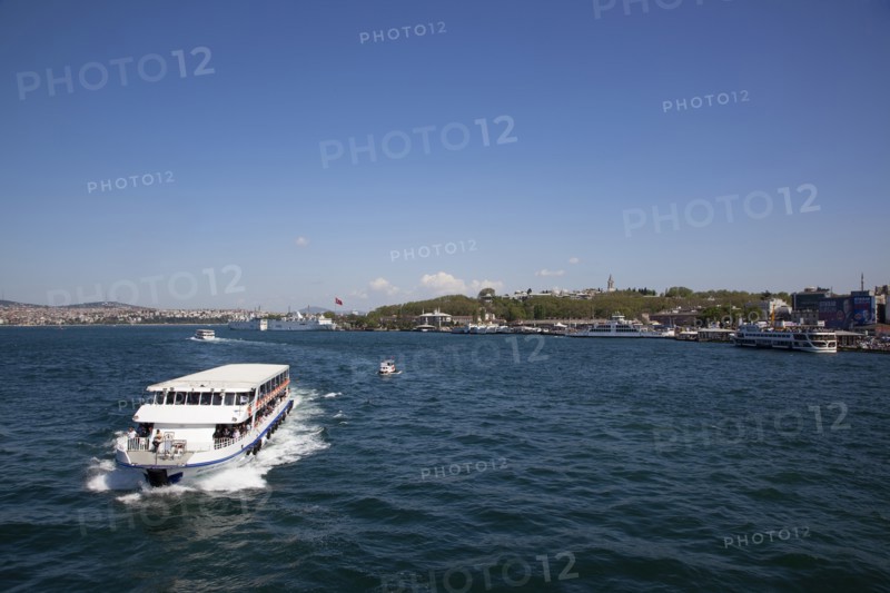 Turkey, Istanbul, Galata Bridge with ferry approaching to pass under. 
Photo : Stephen Rafferty