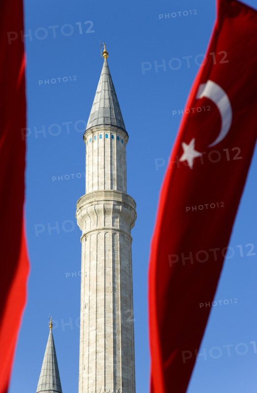 Turkey, Istanbul, Sultanahmet Haghia Sophia minaret and Turkish red flag with white crescent moon and star. 
Photo : Paul Seheult