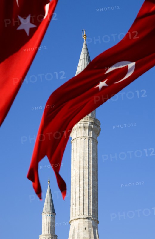 Turkey, Istanbul, Sultanahmet Haghia Sophia minaret and Turkish red flag with white crescent moon and star. 
Photo : Paul Seheult