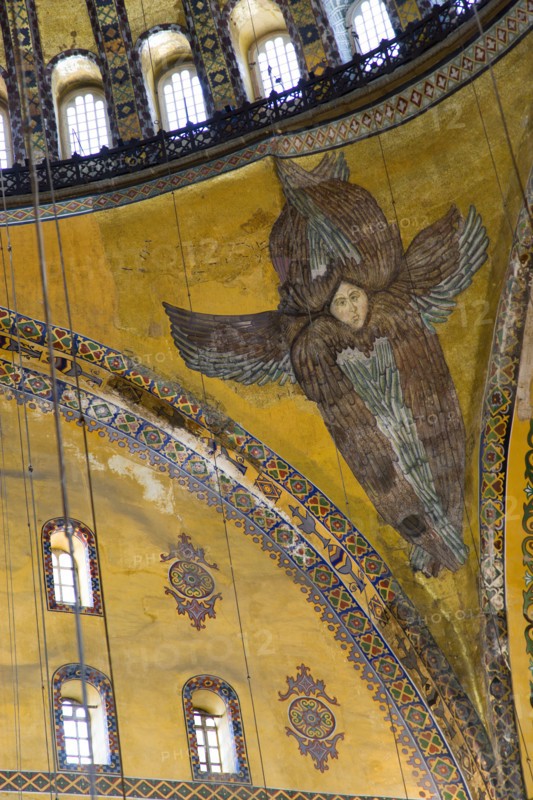 Turkey, Istanbul, Sultanahmet Haghia Sophia Mural of a six winged seraph or angel below the central dome. 
Photo : Paul Seheult