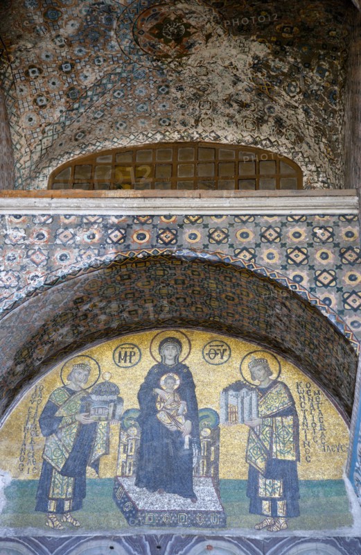 Turkey, Istanbul, Sultanahmet Haghia Sophia Mosaic of The Virgin Mary holding the Infant Jesus flanked by Emperors Constantine and Justinian above the doorway reserved for the Emperor. 
Photo : Paul Seheult