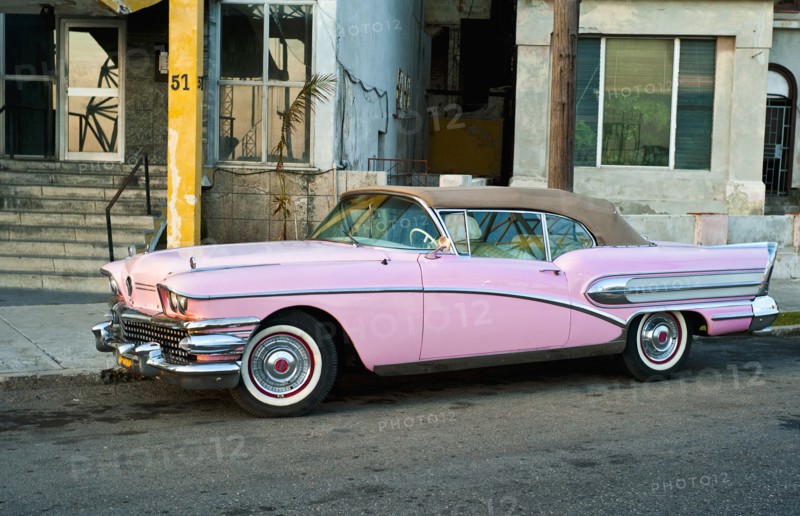 Cuba, Havana, Pink Buick convertile with the roof raised. 
Photo : Richard Rickard