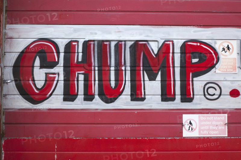 Art, Graffiti, Former parcel delivery warehouse converted into roller disco with the walls decorated by local graffiti artists. Chump written in red paint. 
Photo : Stephen Rafferty