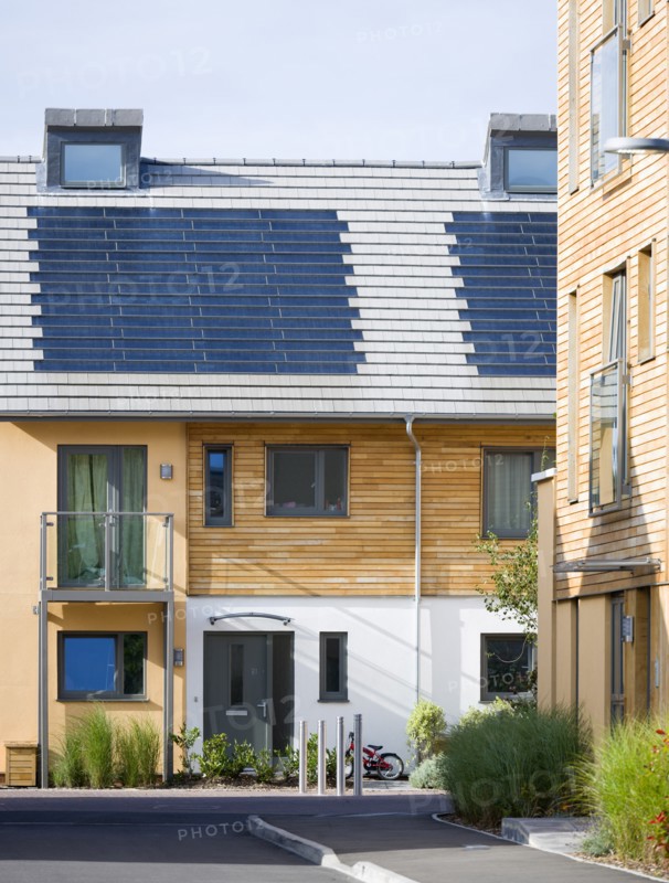 Architecture, Environment, Solar Power, Alternative Energy Electricity Solar photovoltaic roof tiles or slates on new houses by Linden Homes in Graylingwell Park. 
Photo : Paul Seheult