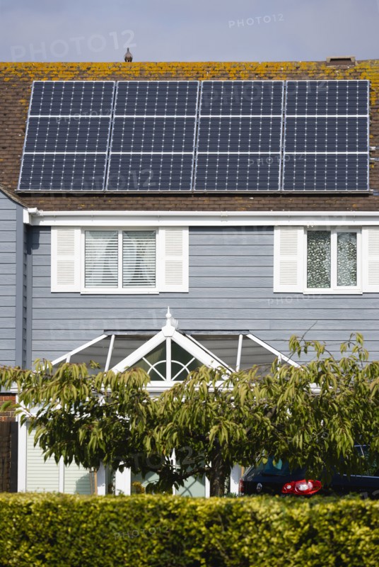 Architecture, Environment, Solar Panels, Alternative Energy Electricity Solar photovoltaic roof panels on detached house for electricity conversion. 
Photo : Paul Seheult