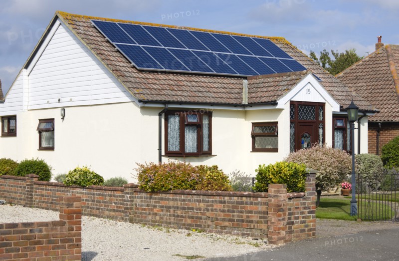 Architecture, Environment, Solar Panels, Alternative Energy Electricity Solar photovoltaic roof panels on detached bungalow house for electricity conversion. 
Photo : Paul Seheult
