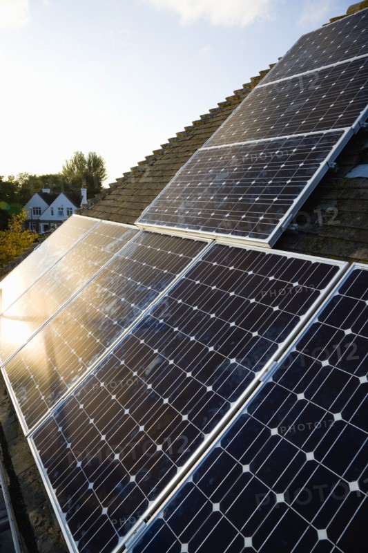 Architecture, Environment, Solar Panels, Alternative Energy Electricity Solar photovoltaic roof panels on detached house for electricity conversion. 
Photo : Paul Seheult