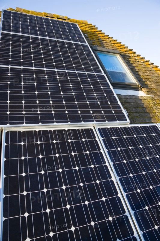 Architecture, Environment, Solar Panels, Alternative Energy Electricity Solar photovoltaic roof panels on detached house for electricity conversion. 
Photo : Paul Seheult