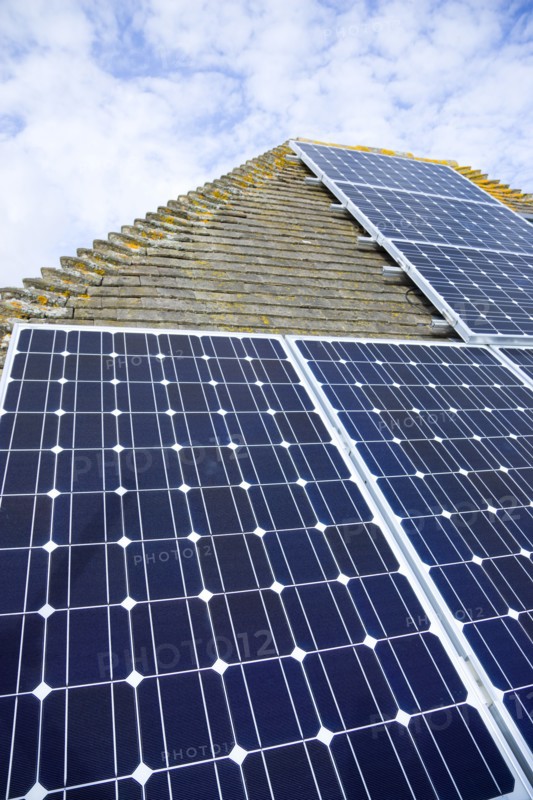 Architecture, Environment, Solar Panels, Alternative Energy Electricity Solar photovoltaic roof panels on detached house for electricity conversion. 
Photo : Paul Seheult