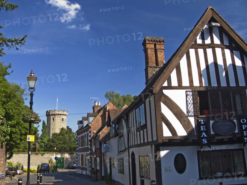 England, Warwickshire, Wawick Castle, View of Tea Shop with Warwick Castle Guys Tower. 
Photo : Chris Penn