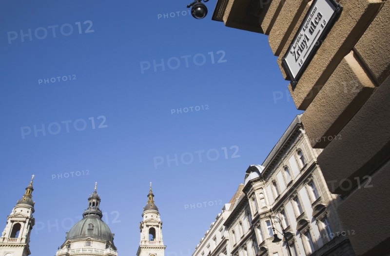 St Stephen's Basilica with Street sign and facades in central Pest.