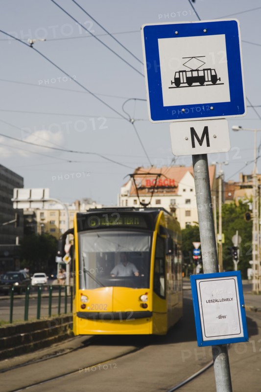 Tram arriving at stop in Pest city centre.