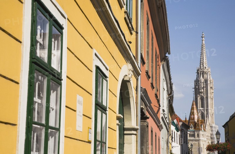 Buda Castle District: Matyas Church viewed from street of restored facades.
