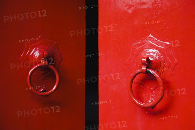 Temple doors painted bright red an auspicious colour.