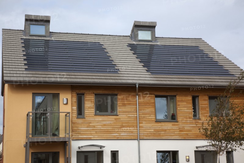 Graylingwell Park Modern housing with solar panels blended seamlessly in to roof tiles.