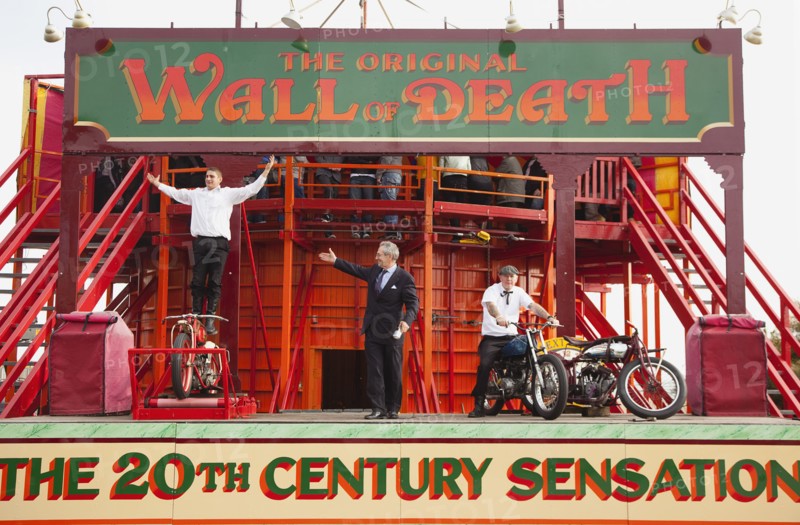 Wall of death motorcycle fairground attraction on Madeira Drive during motorbike festival.