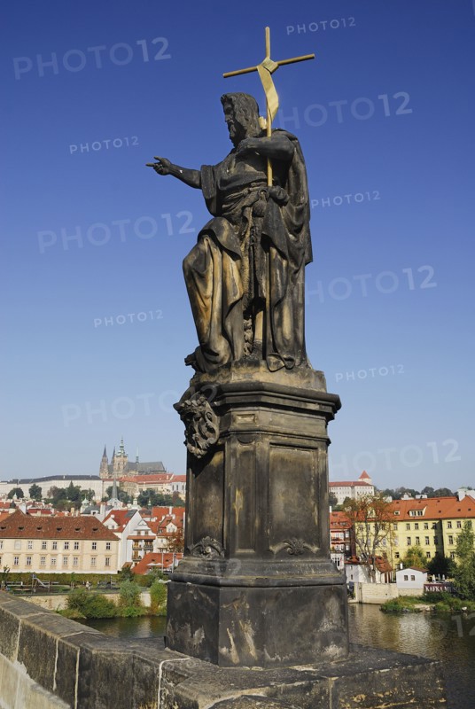 Charles Bridge Statue of John the Baptist with St Vitus.
