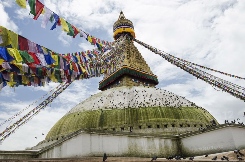 Boudhanath Stupa near Kathmandu, with coloutful prayer flags.