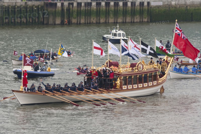 Rowers aboard Gloriana proceed along River Thames as part of the Queens Thames Diamond Jubilee Pageant taken from Tower Bridge 3rd June 2012.