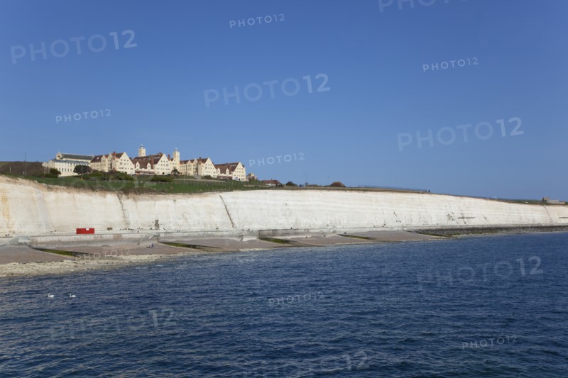 White cliff coastline with Roedean private school for girls.