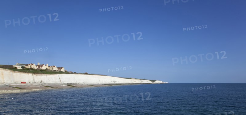 White cliff coastline with Roedean private school for girls.