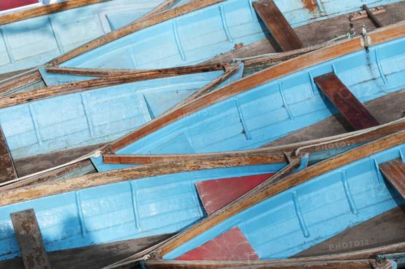 Moored rowing boats on the river Cherwell near Magdalen bridge.