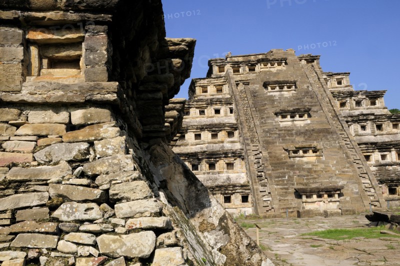 Mexico, Veracruz, Papantla, El Tajin archaeological site Corner of Monument 5 pyramid with Pyramide de los Nichos part seen behind. Photo : Nick Bonetti