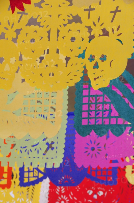Mexico, Oaxaca, Brightly coloured decorations and symbols for Dia de los Muertos or Day of the Dead festivities. Photo : Nick Bonetti